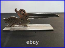 11 porte couteaux en métal argenté Art déco représentant des sujets animaliers
