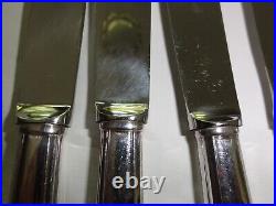 12 couteaux manches en métal argenté Art Déco