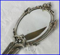 Ancien grand miroir face a main finement travaillé métal argenté art déco