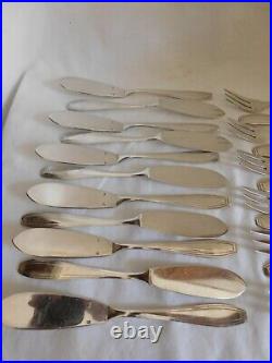 Apollo douze fourchettes onze couteaux à poisson métal argenté art déco