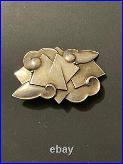 Broche Art Déco argent massif nuages stylisés décor géométrique bijou d'artiste