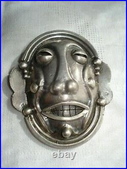 Broche pendentif en argent yeux mobiles Exposition Coloniale de 1931