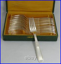 Christofle modèle Cirta, 12 fourchettes de table, métal argenté, Art Déco, écrin