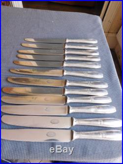 Ercuis 24 couteaux de tables et à déssert métal argenté art déco dans écrins