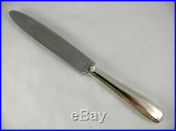 Ercuis modèle Art Déco, 12 couteaux de table, métal argenté
