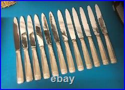 Lot de 24 couteaux ART DECO en métal argenté Lames inox + couverts de service
