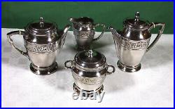 Service 4 pièces à thé et café en métal argenté