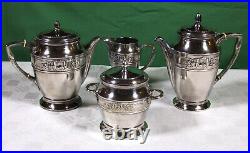 Service 4 pièces à thé et café en métal argenté