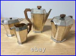Service à thé et café en métal argenté poignée palissandre Période ART DECO